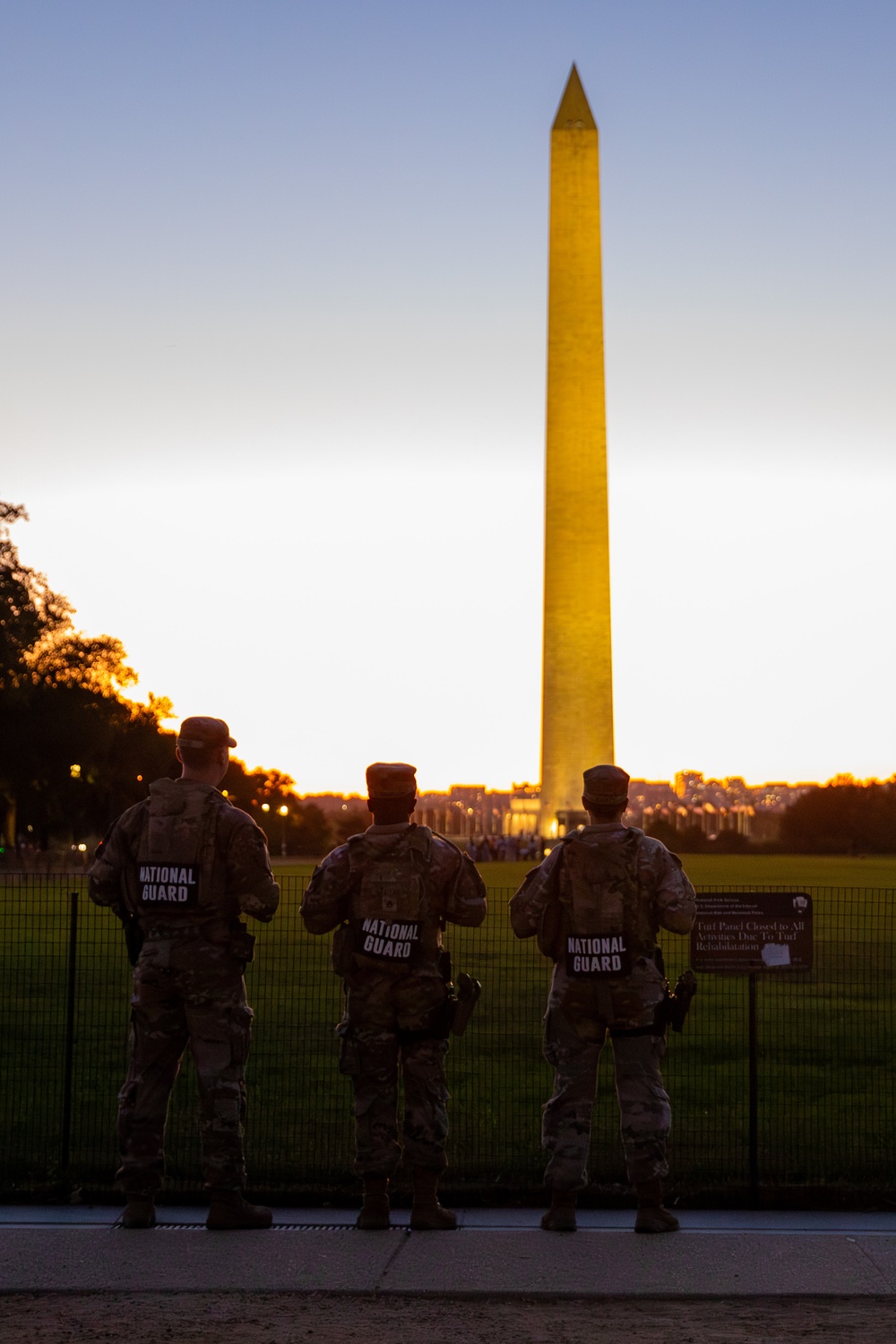 Mississippi Army National Guard Soldiers watch the sunset at the Washington Monument