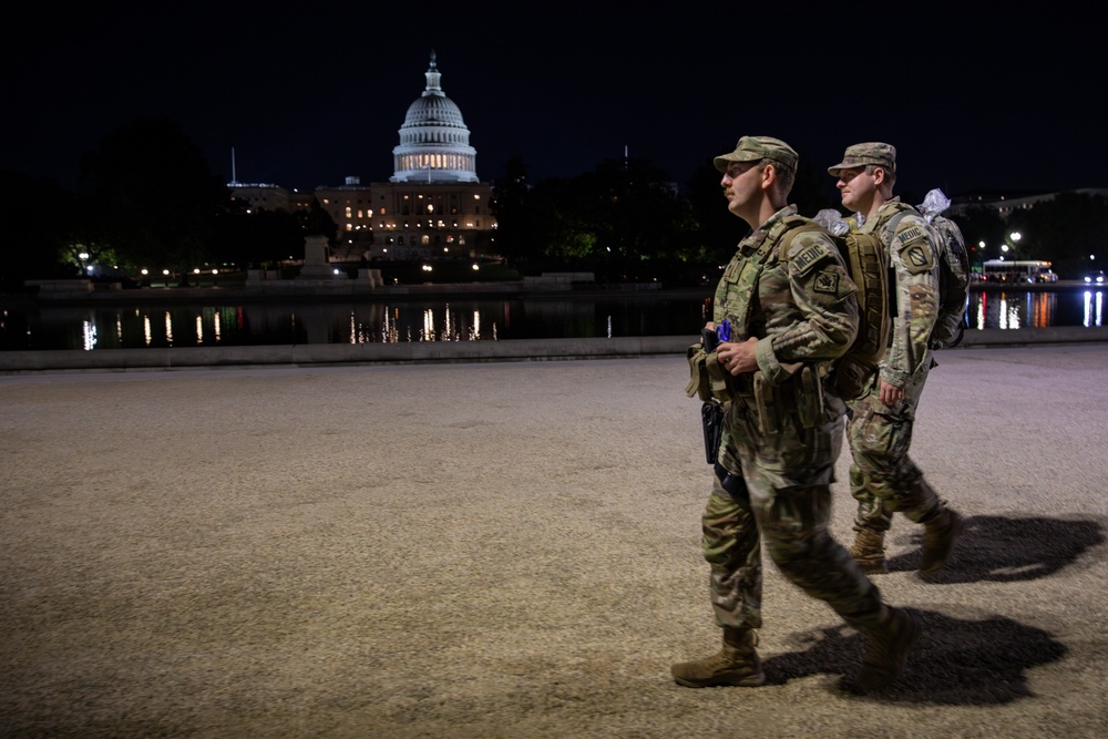 Mississippi Army National Guard Soldiers patrol in front of the Capitol