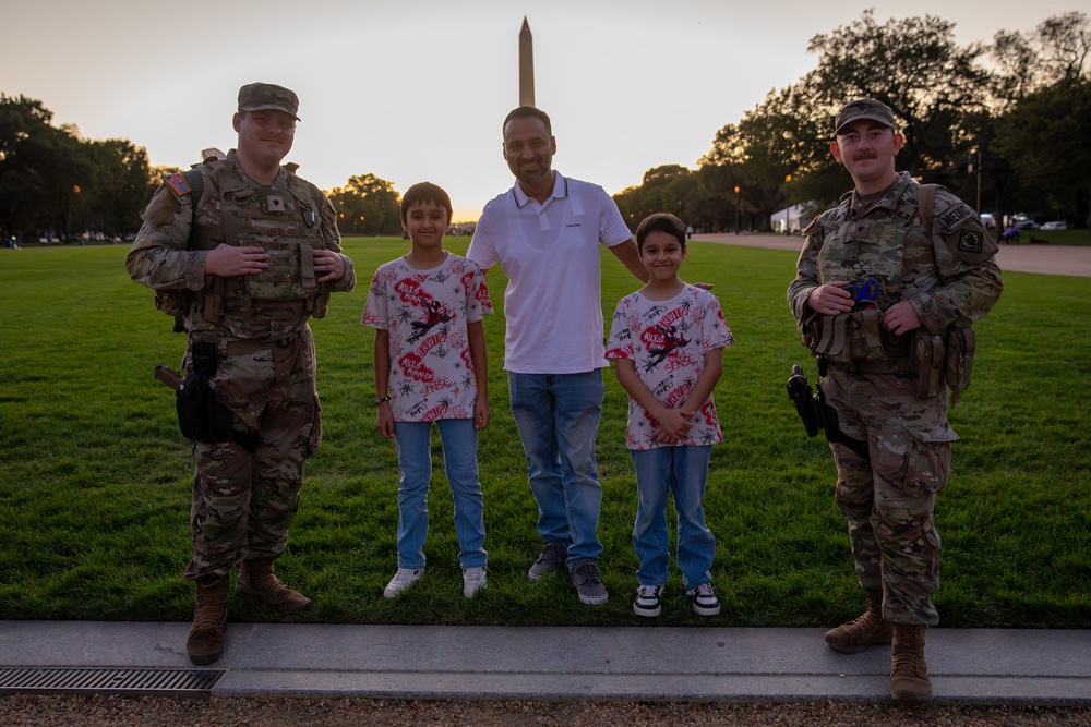 Mississippi Army National Guard Soldiers take photos with members of the public in Washington D.C.