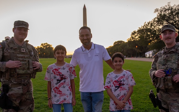 Mississippi Army National Guard Soldiers take photos with members of the public in Washington D.C.