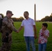 A Mississippi Army National Guard Soldier shakes hands with a civilian on the National Mall