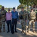 Mississippi National Guard Troops take a photo with civilians