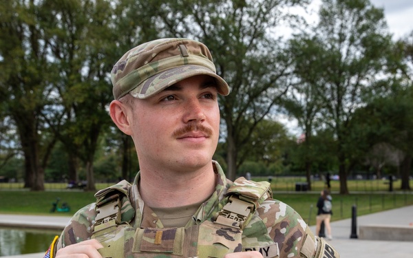 A Mississippi Army National Guard Soldier on patrol in front of the Lincoln Memorial