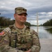 A Mississippi Army National Guard Soldier on patrol in front of the Lincoln Memorial Reflecting Pool