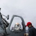 Sailors aboard the USS John Finn conduct a crash and salvage drill in the Philippine Sea