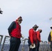 Sailors aboard the USS John Finn conduct a crash and salvage drill in the Philippine Sea
