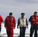 Sailors aboard the USS John Finn conduct flight quarters in the Philippine Sea