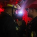 Sailors aboard the USS John Finn conduct a damage control drill in the Java Sea