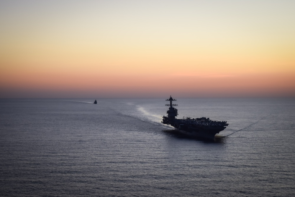 Italian Navy Offshore Patrol Vessel ITS Paolo Thaon di Revel (P430) Sails with USS Gerald R. Ford (CVN 78)