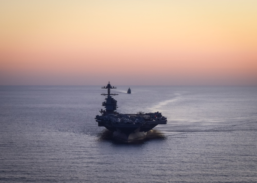 Italian Navy Offshore Patrol Vessel ITS Paolo Thaon di Revel (P430) Sails with USS Gerald R. Ford (CVN 78)