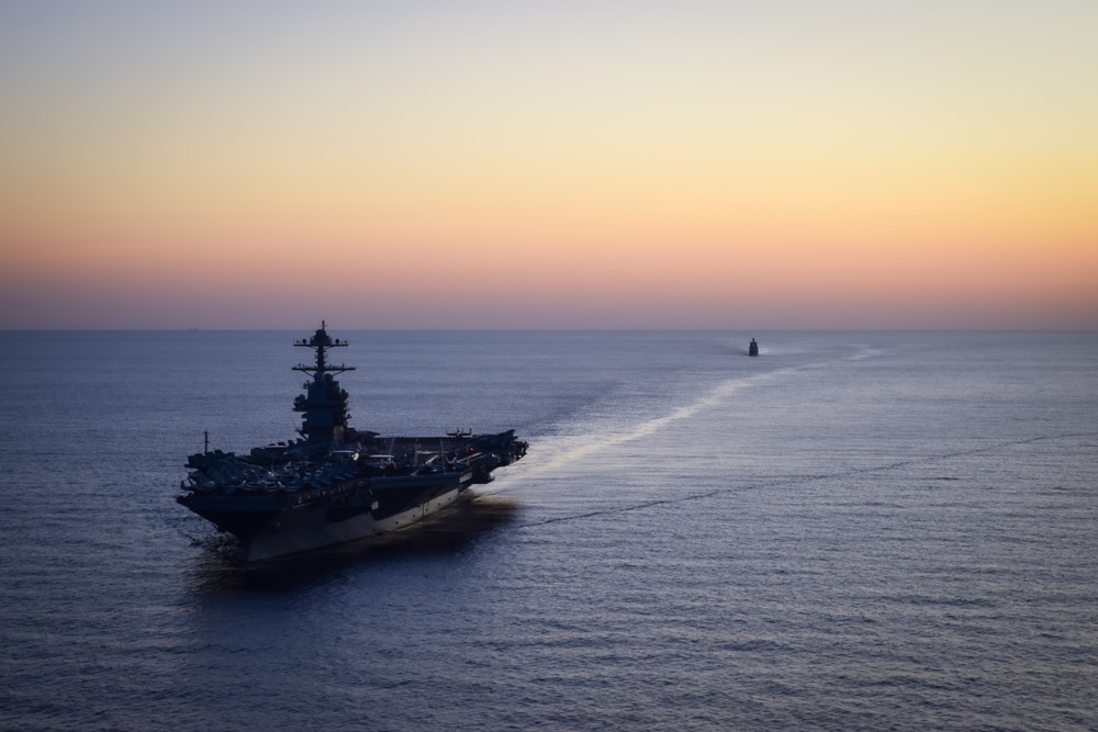 Italian Navy Offshore Patrol Vessel ITS Paolo Thaon di Revel (P430) Sails with USS Gerald R. Ford (CVN 78)