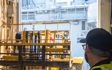 USS America (LHA 6) Conducts Store Onload