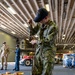 USS America (LHA 6) Conducts Stores Onload in the Hangar Bay