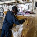 USS America (LHA 6) Conducts Stores Onload in the Hangar Bay