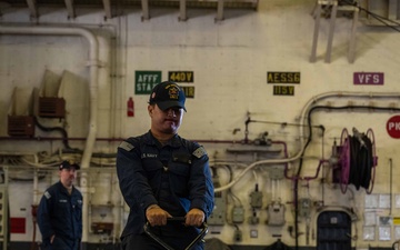 USS America (LHA 6) Conducts Stores Onload in the Hangar Bay