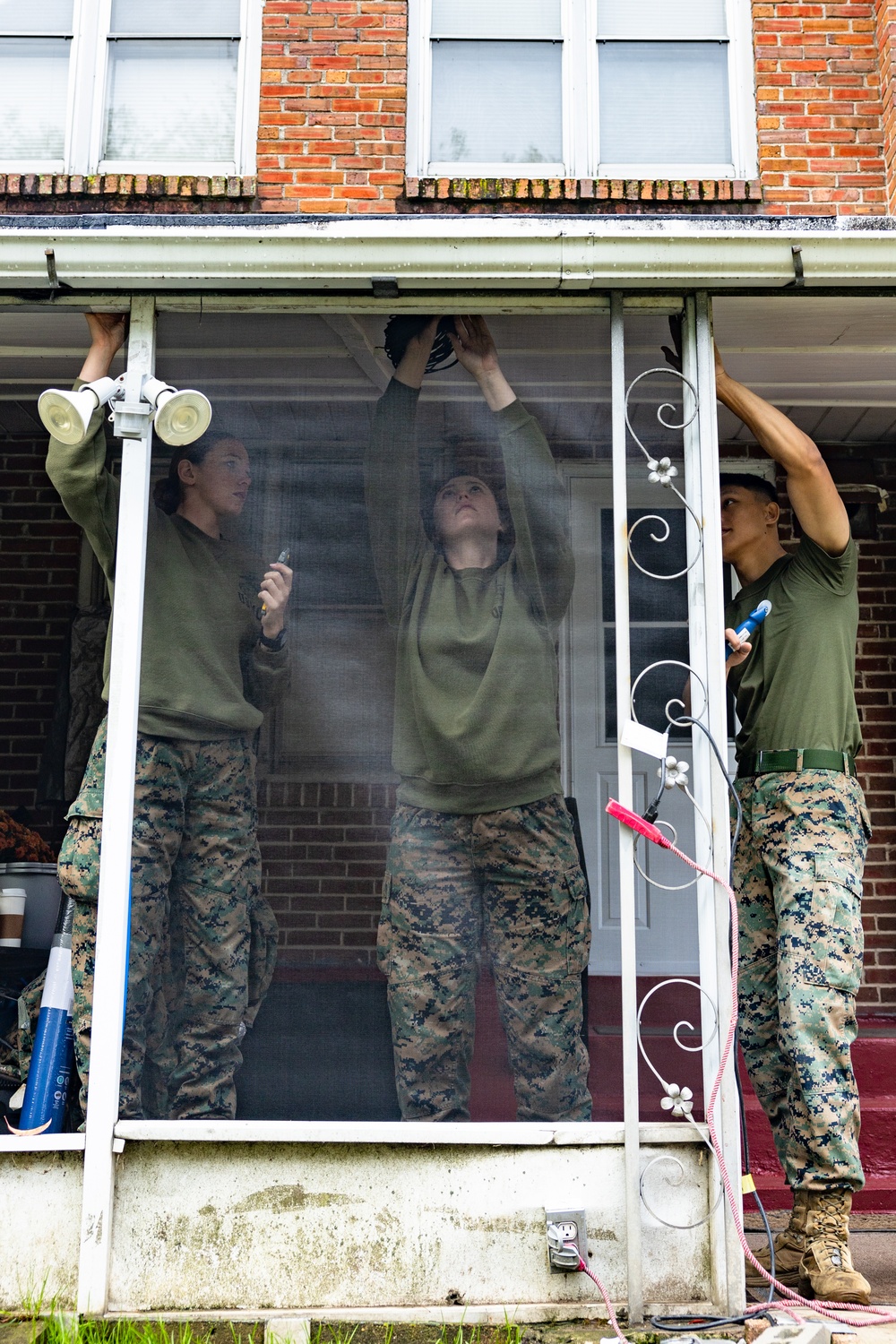 Navy and Marine Corps Volunteer with Habitat for Humanity