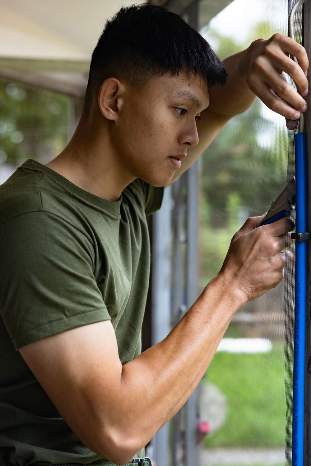 Navy and Marine Corps Volunteer with Habitat for Humanity