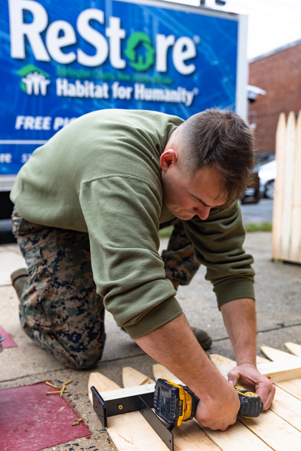 Navy and Marine Corps Volunteer with Habitat for Humanity