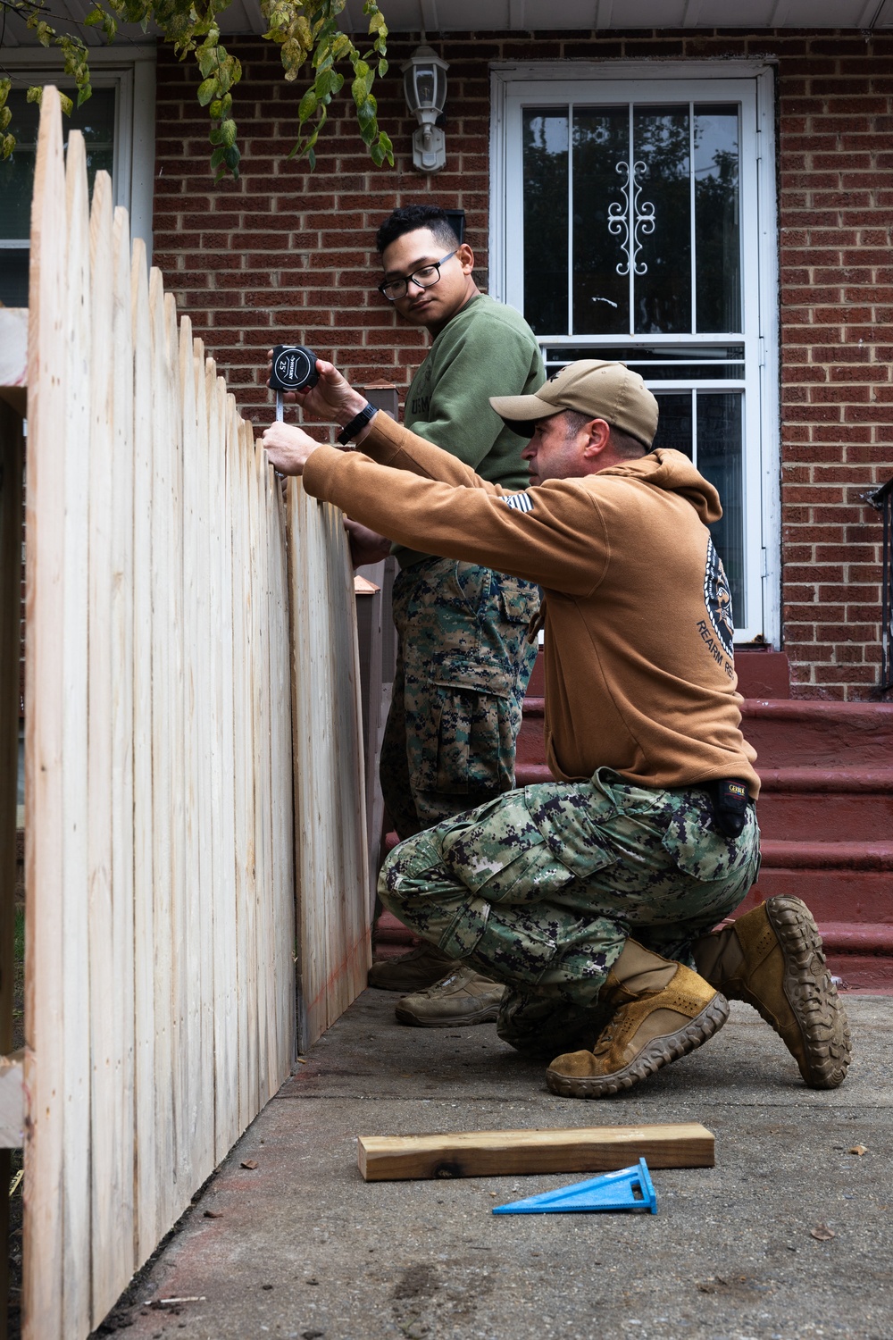Navy and Marine Corps Volunteer with Habitat for Humanity