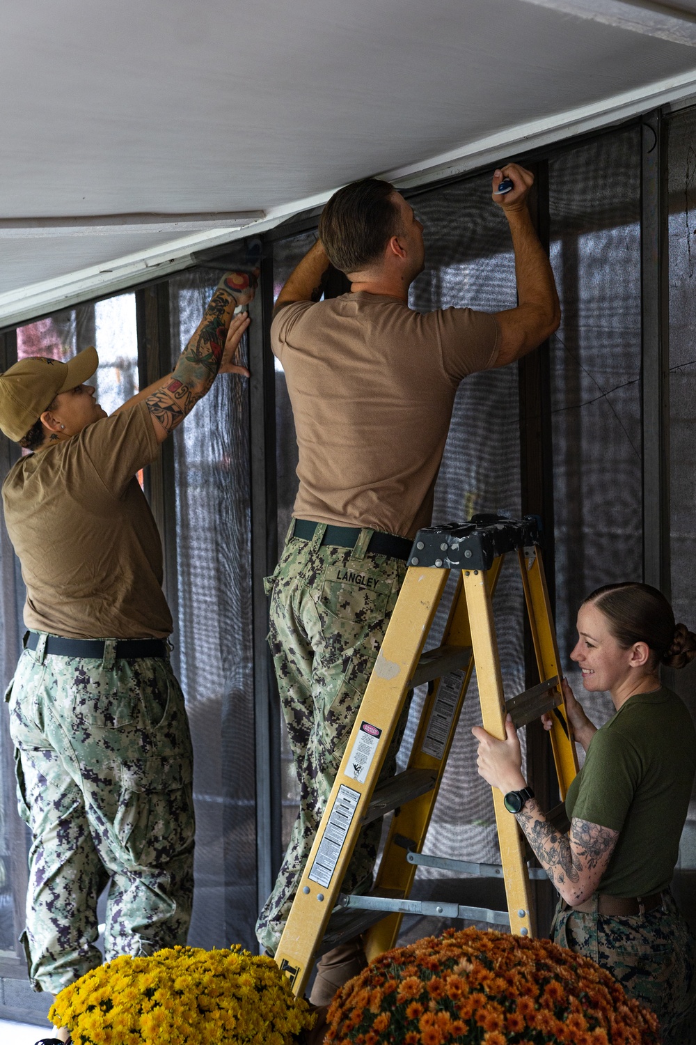 Navy and Marine Corps Volunteer with Habitat for Humanity