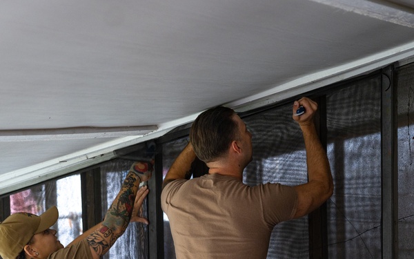 Navy and Marine Corps Volunteer with Habitat for Humanity