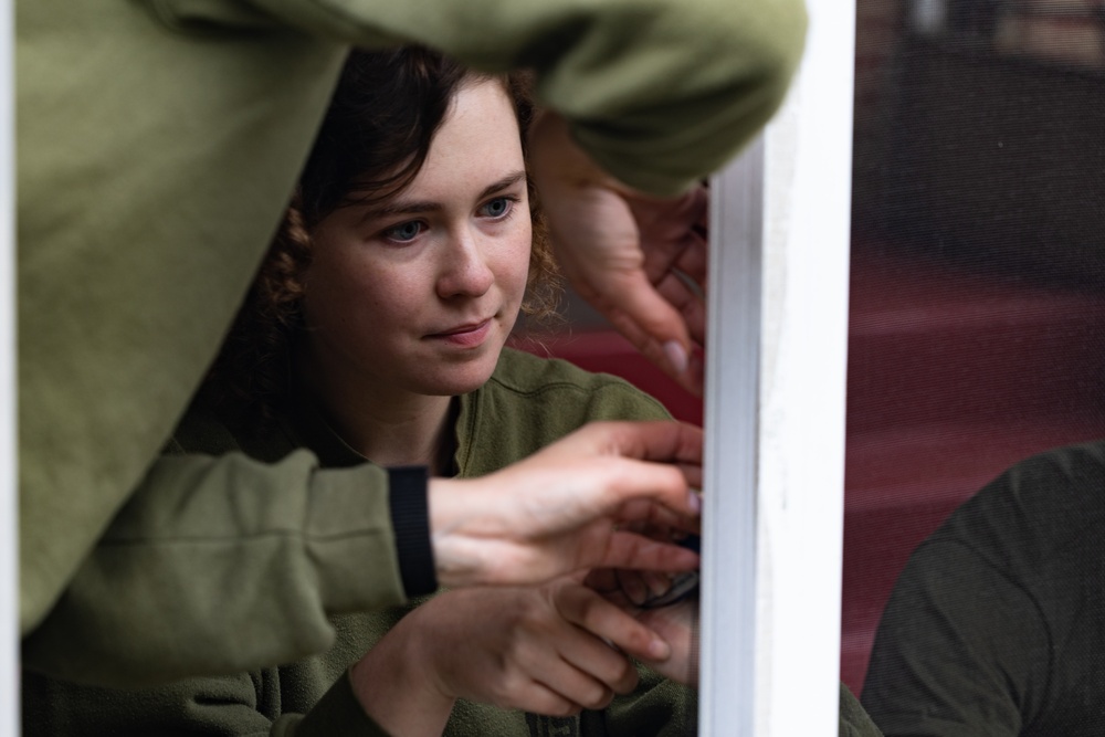 Navy and Marine Corps Volunteer with Habitat for Humanity