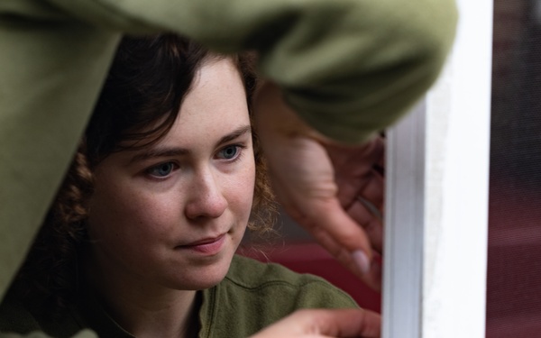 Navy and Marine Corps Volunteer with Habitat for Humanity