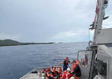 U.S. Coast Guard, Guam Fire Department rescue 45 people from boat off Agat, Guam