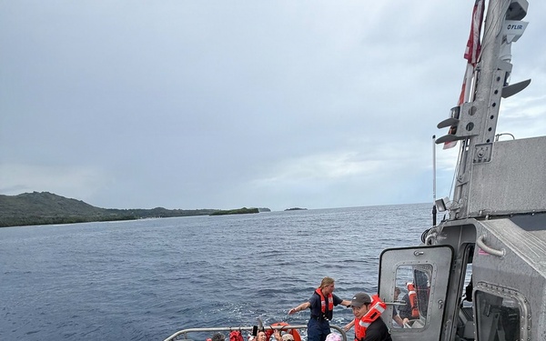 U.S. Coast Guard, Guam Fire Department rescue 45 people from boat off Agat, Guam