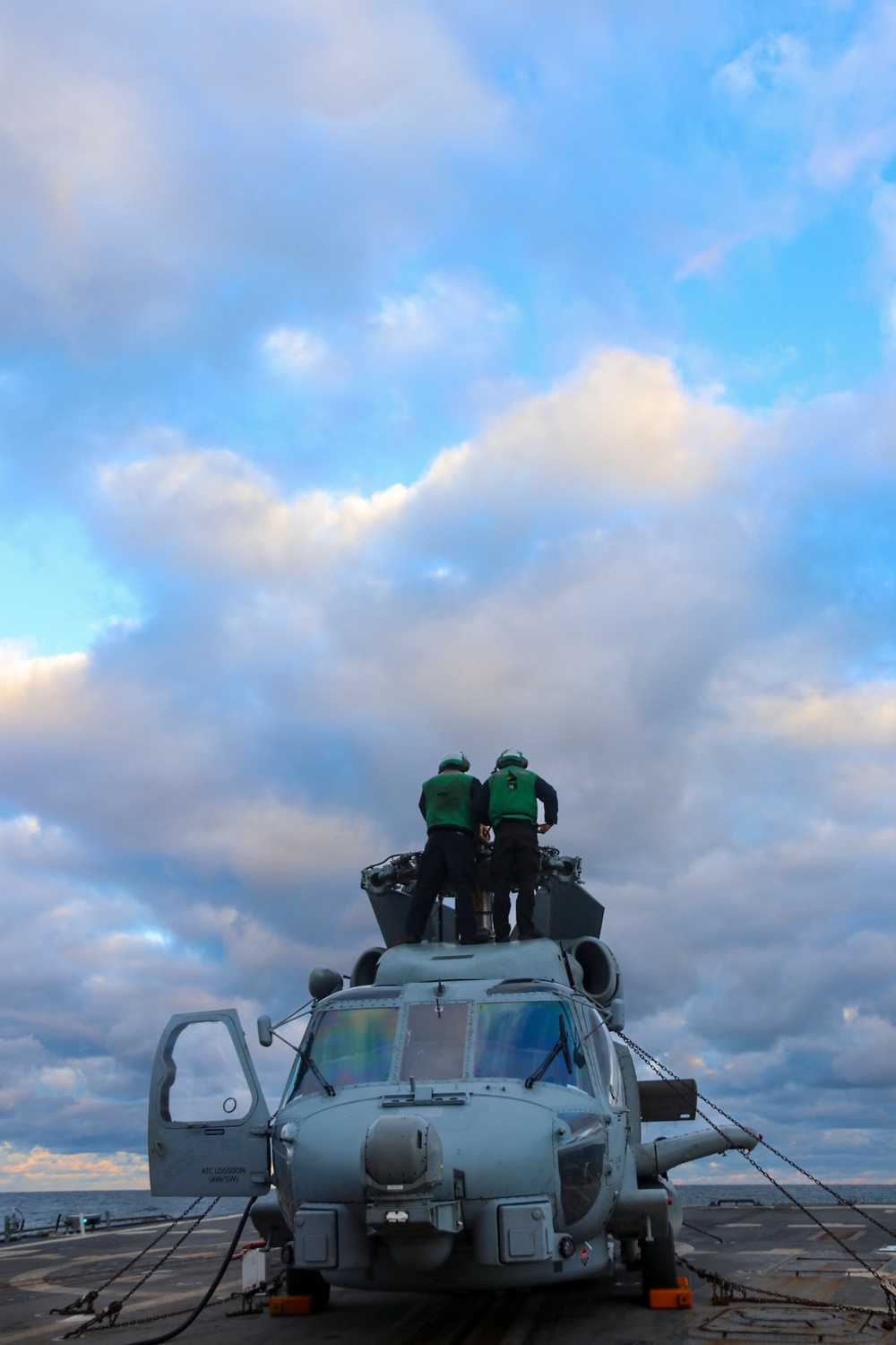 AEAN Bruce Wade and AE2 Paul Tran conduct post flight securing operations