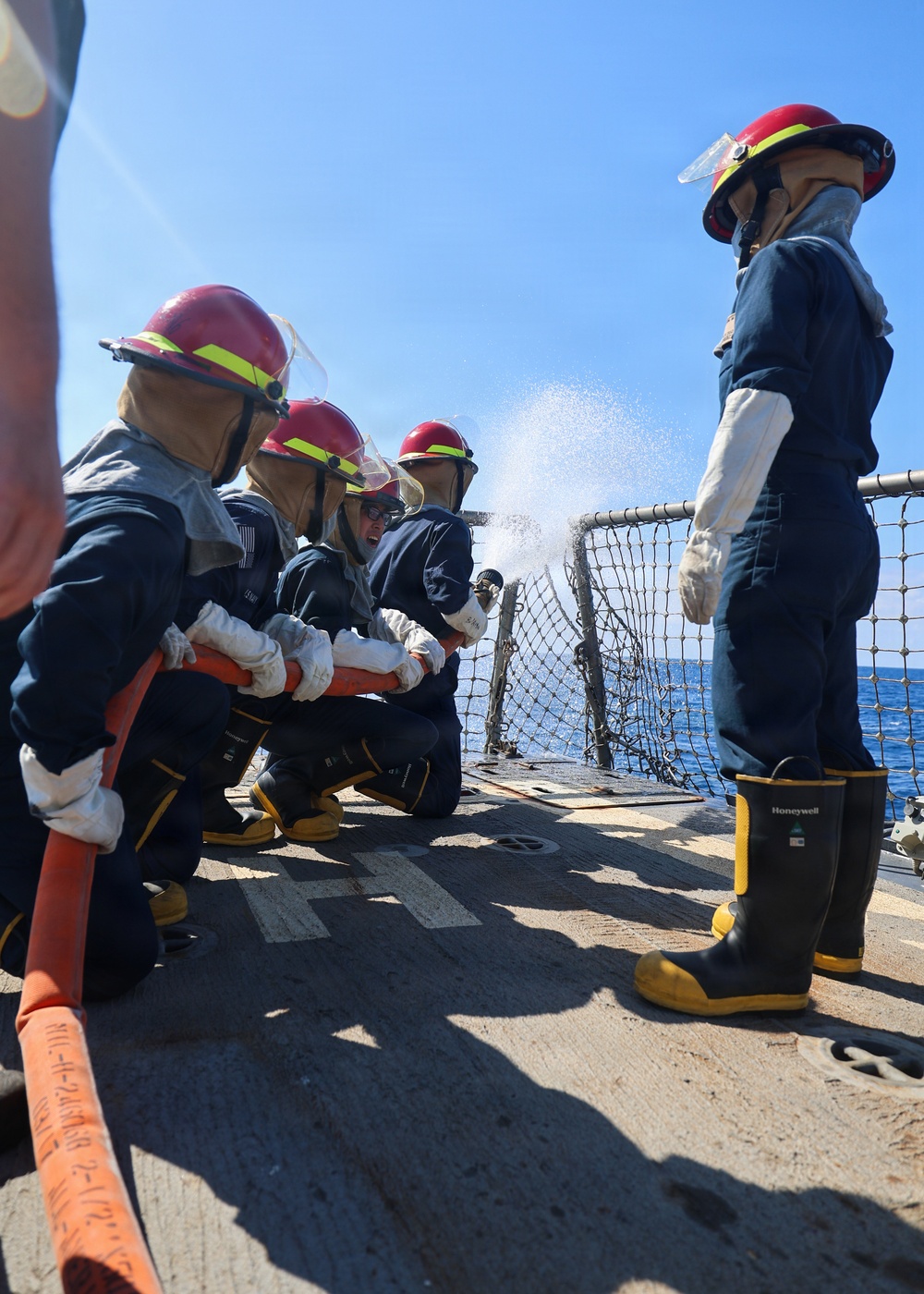 Damage Control Training on the flight deck of USS Paul Ignatius (DDG 117)