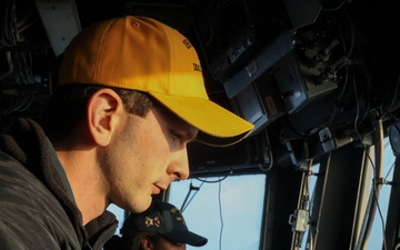 Lt.j.g. Radford Wyrick and Lt.j.g. Kyla Sanders execute maneuvers at sea