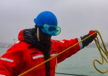 BMSN William Mwiseneza prepares a heaving line during a low visibility sea-and-anchor