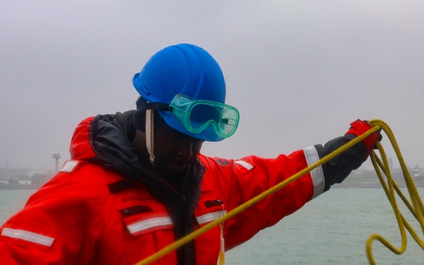 BMSN William Mwiseneza prepares a heaving line during a low visibility sea-and-anchor