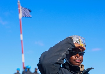 BM2 Jalynn Simmons conducts a communications check from the foc’sle