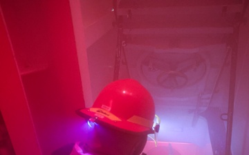 USS Bulkeley (DDG 84) Sailors respond to a simulated class bravo fire