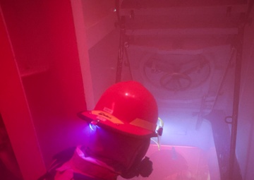 USS Bulkeley (DDG 84) Sailors respond to a simulated class bravo fire