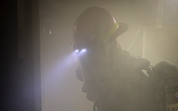 USS Bulkeley (DDG 84) Sailors operate firehoses and respond to a simulated class bravo fire