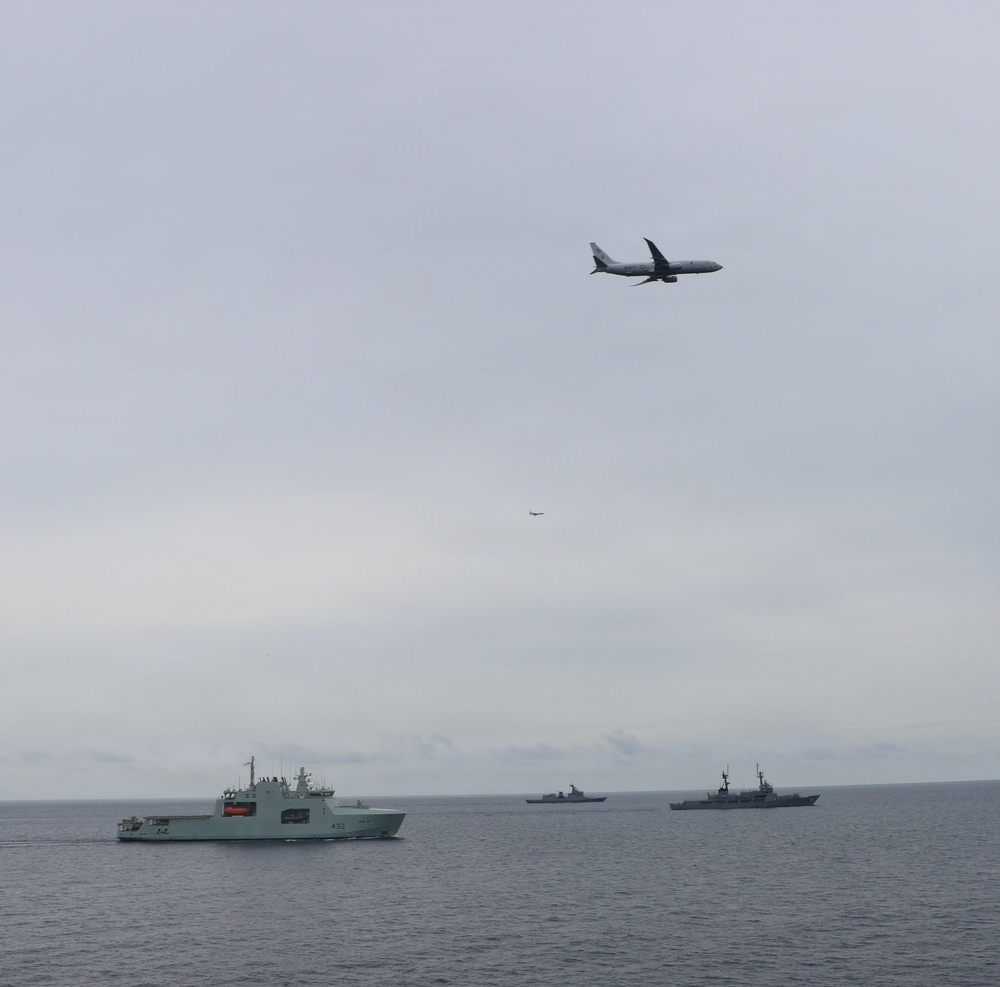 U.S. Navy, Philippine Navy, Japanese Maritime Self-Defense Force, and Royal Canadian Navy sail in formation