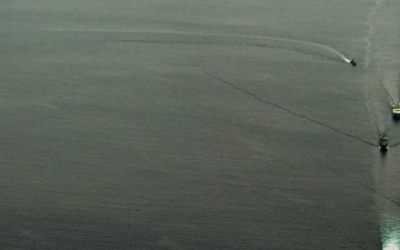 U.S. Navy, Philippine Navy, Japanese Maritime Self-Defense Force, and Royal Canadian Navy sail in formation