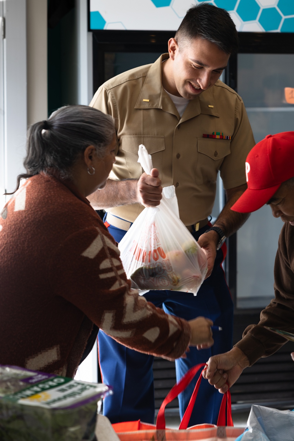 Navy and Marine Corps Volunteer at Small Things Market in Philadelphia