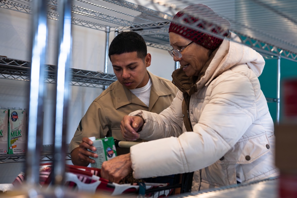 Navy and Marine Corps Volunteer at Small Things Market in Philadelphia
