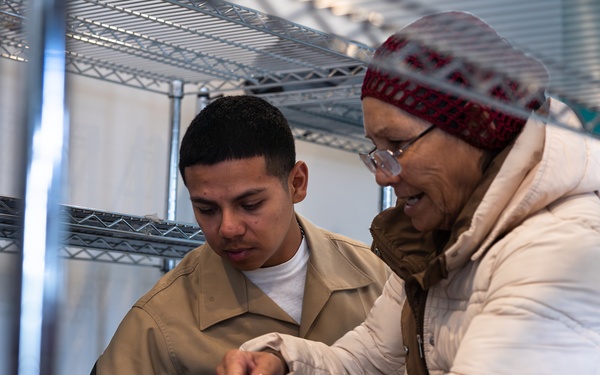Navy and Marine Corps Volunteer at Small Things Market in Philadelphia