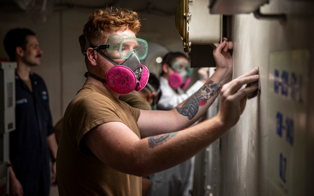 George Washington Sailors Conduct Paint Preparation