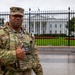 Joint Task Force Magnolia Commander, Lt. Col. Steven Jackson, gives a thumbs up in front of the White House