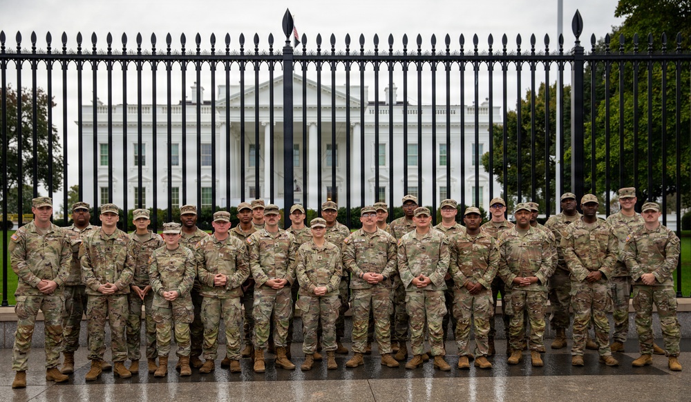 Mississippi National Guardsmen take a photo after a promotion ceremony in front of the White House