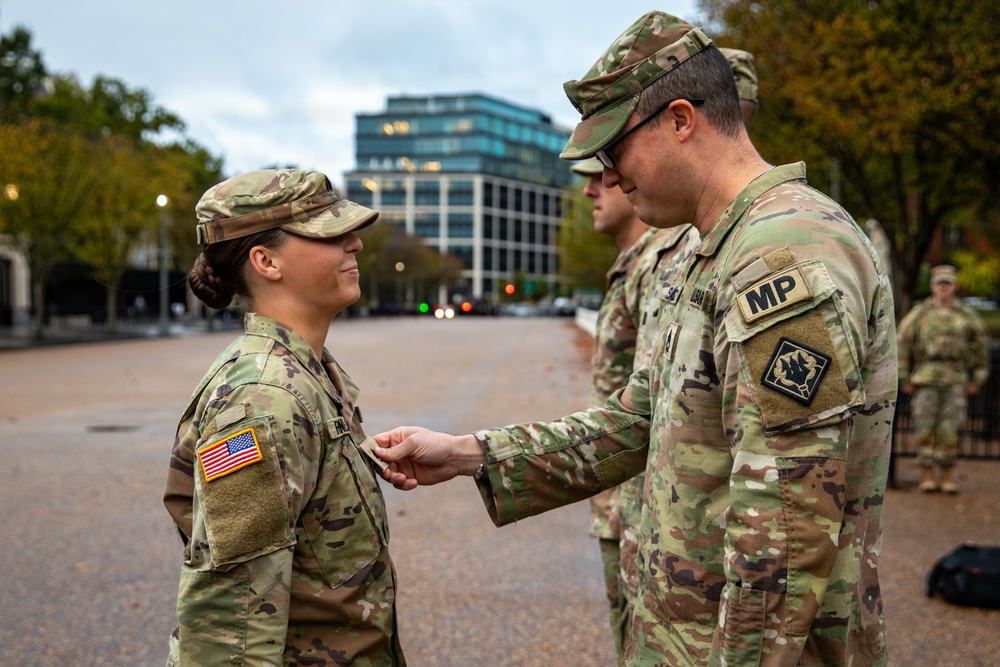 U.S. Army Sgt. Kaylyn Runnels, 112th Military Police Battalion, MSNG, is promoted to the rank of Staff Sgt.