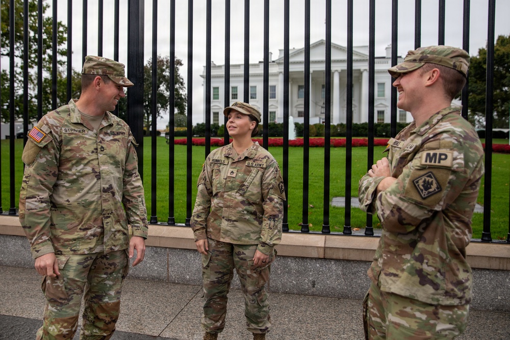 Mississippi National Guards Troops talk after promotion ceremony in front of the White House