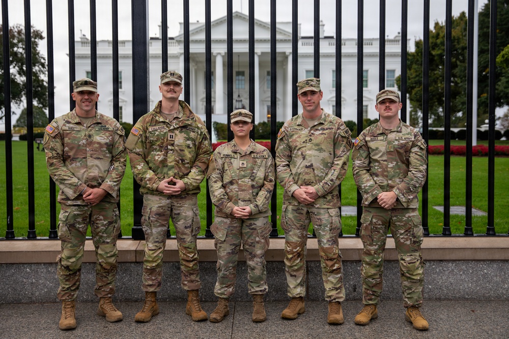Mississippi National Guard Soldiers pose after a promotion ceremony in front of the White House