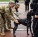 Mississippi National Guard Soldiers pet a Secret Service K-9 in front of the White House
